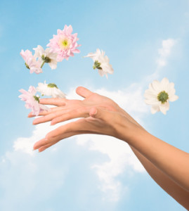 women hands and flowers